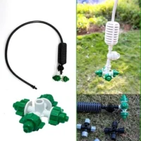 4 way mister nozzle for greenhouse cooling and irrigation systems Fine mist irrigation nozzle with four-direction spray pattern Agricultural 4 way mister installed in greenhouse environment Hydroponic misting sprinkler for humidity and moisture control UV-resistant greenhouse mister for nursery and crop cooling Water-saving 4 way mister used in modern farming systems