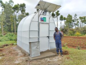 200kg–300kg hybrid solar dryer with biomass heater and automated temperature humidity control system in Kenya