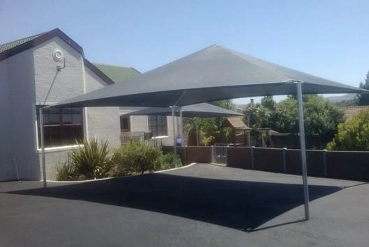 Shade net carport Kenya
Steel gable roof carport
UV treated shade net roofing
Parking shade structure Kenya