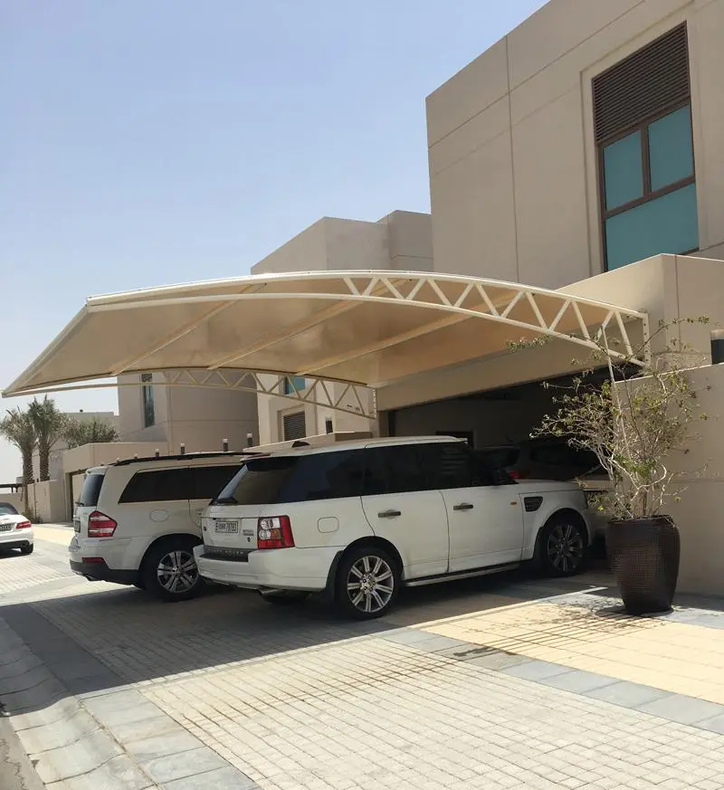 Double-bay wall-mounted car shade Wall-mounted carport Kenya Two-car shade net carport HDPE shade net car shed Steel wall-mounted car shelter Residential double carport Commercial parking canopy UV-treated shade net roofing Attached carport design Modern car shade installation